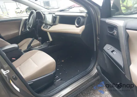 2014 Toyota Rav4 Xle z USA, uszkodzony, nr VIN JTMWFREV7ED036561